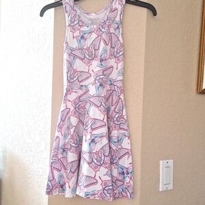 A beautiful dress with very colorful butterflies all over